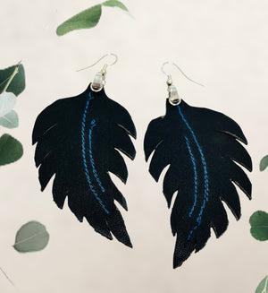 “DANCE IN THE WIND”~Soft Black Fleathers with Bright Blue Stitching and Silver Loops